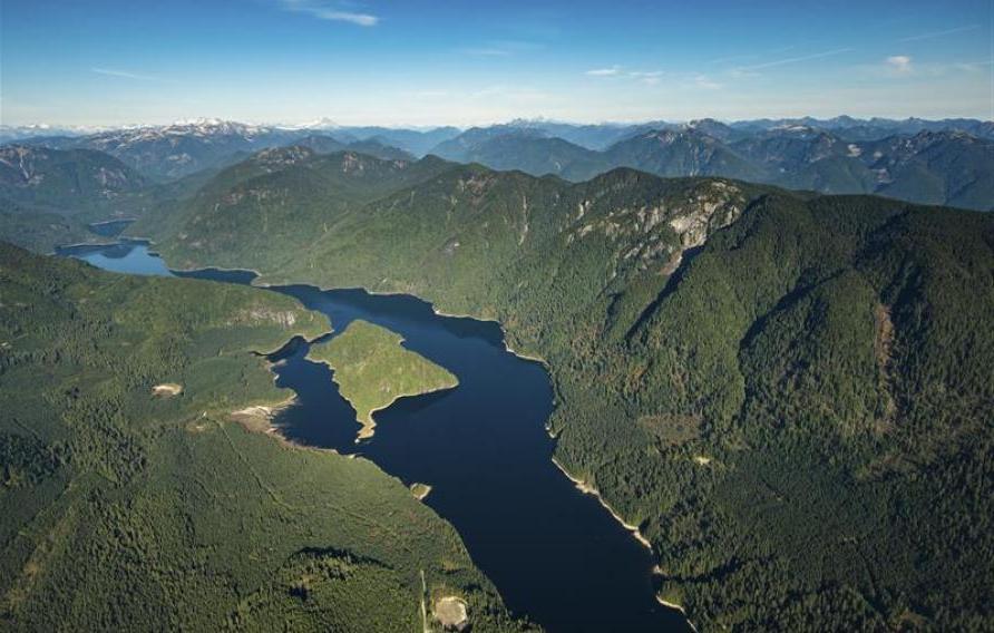 Stock aerial photo of the Coquitlam Lake Reservoir and mountains, Canada